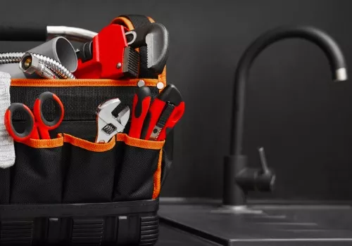 A tool bag containing tools from a plumbing company in Peoria IL