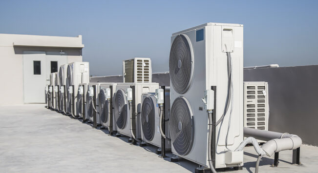 Commercial Heating and Cooling Pekin IL, air condition outdoor unit compressor install outside the building